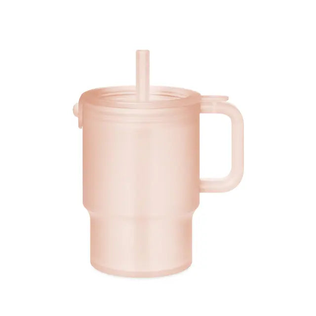 A coral Olababy silicone tumbler on white with a handle, lid and straw, the straw visible through the wall of the tumbler.